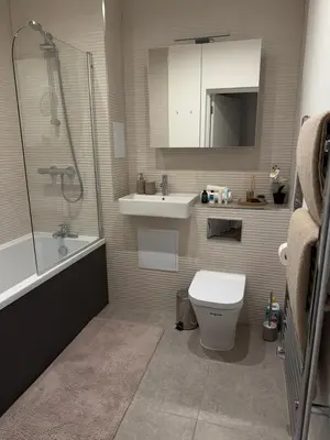 a bathroom with a toilet and a sink and a shower at Cosy one bedroom flat in the heart of Chelmsford in Chelmsford