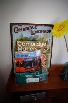 a magazine sitting on top of a table at Stylish self contained city apartment in Milton