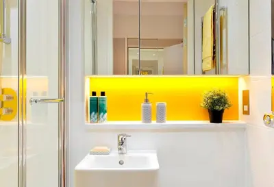 a bathroom with a sink and a mirror at For Students Only - Student Castle Cambridge in Cambridge