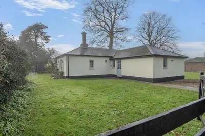 an old white house with a yard at 2 Bed in Bressingham oc-f33646 in Bressingham