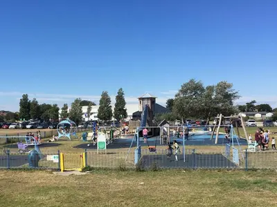 a group of people playing in a park at Period Family House by the Beach in Walton-on-the-Naze