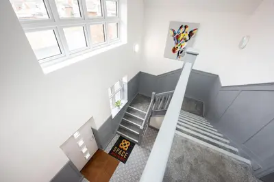an overhead view of a staircase in a house at 5 The Royal Serviced Apartments Harwich, Private Parking, Fast Wifi in Parkeston