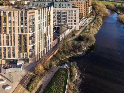 an aerial view of a city with a river and buildings at The Opulent Property Project ChelmsfordCityCentre 2Bed2Bath FreeParking Balcony in Chelmsford