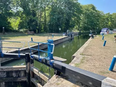a body of water with a blue object in it at Riverside Retreat in Little Baddow