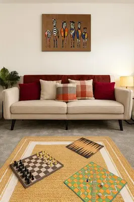 a living room with a couch and a chess board at Nr Addenbrookes Large Hot Tub Stay Sleeps 10 in Barnwell Junction Station