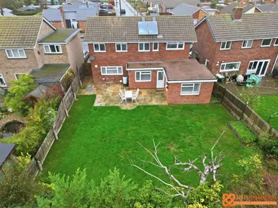 an aerial view of a yard of a house at 4 Bed, 2 Bath Detached House, Parking, Fast Wifi in Colchester