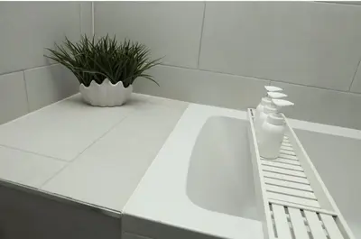 a white counter top with a bottle and a plant at Modern 2 Bed 2 Bath Apartment In Colchester, Walk To Town Center & Station in Colchester