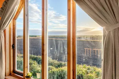a window with a view of the ocean at 1 Bed in Orford oc-m34121 in Orford