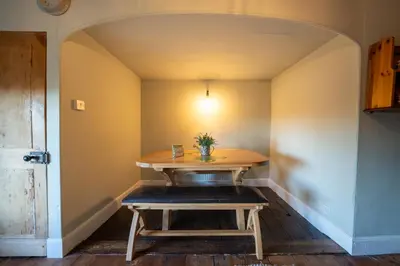 a table in the corner of a room at The Old Rectory Framlingham in Framlingham