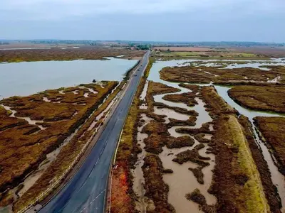an aerial view of a road next to a river at Digby house flat 2 in West Mersea