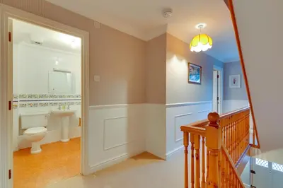 a bathroom with a toilet and a sink at Stylish Modern Home in City Centre Free Parking - Pass the Keys in Cambridge