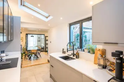a kitchen with a sink and a counter top at 9 Chantry Road, Saxmundham in Saxmundham