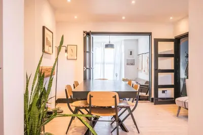 a dining room with a table and chairs at 9 Chantry Road, Saxmundham in Saxmundham