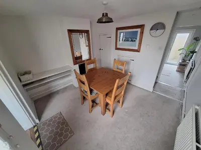an overhead view of a dining room table and chairs at Room in Stowmarket in Stowmarket