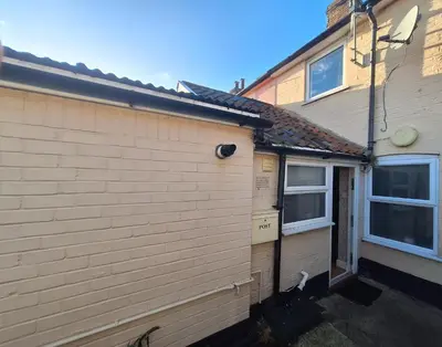 a side view of a house with a window at Room in Stowmarket in Stowmarket
