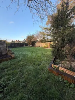 a garden with a tree in a yard at The Grantchester - Charming 20th Century Home in Barton