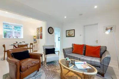 a living room with a couch and a table at 2 Bed in Scole oc-p34354 in Scole