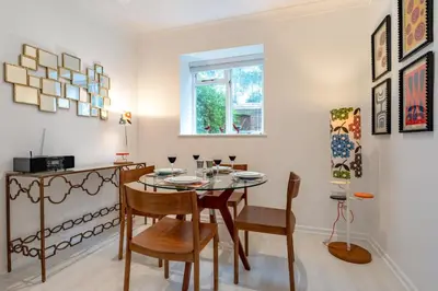 a dining room with a table and chairs and a window at 2 Bed in Scole oc-p34354 in Scole