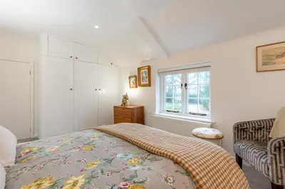 a bedroom with a bed and a window at 2 Bed in Scole oc-p34354 in Scole