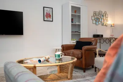 a living room with a couch and a coffee table at 2 Bed in Scole oc-p34354 in Scole
