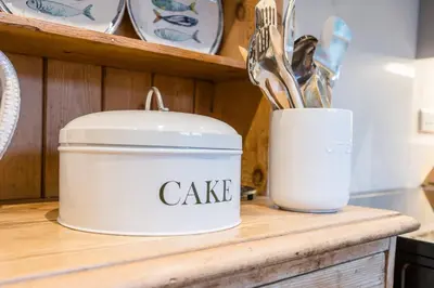 a can of cake sitting on top of a counter at 7 Highbury Cottages, Leiston in Leiston