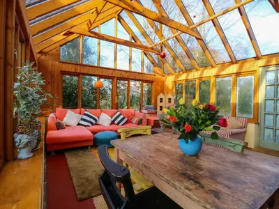 a living room with a couch and a table at Town Farm in Eye
