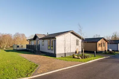 a small house on the side of a road at Finest Retreats - Pembroke Luxury Lodge