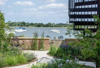 a view of a body of water with boats at Quayside Cottage in Waldringfield