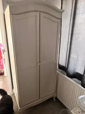 a white cabinet in a room with a window at Single room in Canvey island in Hadleigh