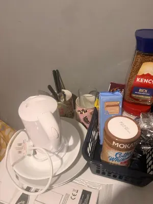 a counter top with a blender and other kitchen items at Single room in Canvey island in Hadleigh