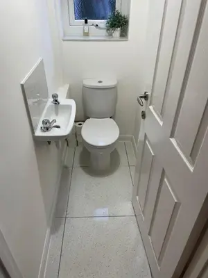 a white bathroom with a toilet and a sink at Detached, 5 Double Bedrooms, 3 En-Suites, 5 Car Parking in Lexden