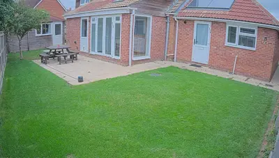 a backyard with a picnic table and a bench at Detached, 5 Double Bedrooms, 3 En-Suites, 5 Car Parking in Lexden