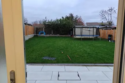a view of a yard from a door at 1 Bed LuxuryHouse- Sleeps 2- Garden Wifi Parking in Hornchurch