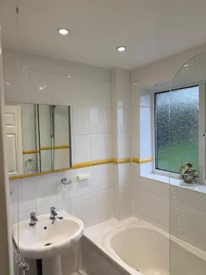a bathroom with a sink and a bath tub at 3 bed house, sleeps 5, 8 mins to Harold wood Station in Havering atte Bower