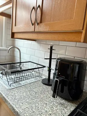 a toaster sitting on a counter in a kitchen at The Opulent Property Project Southend 4 Bed Sleeps 7 in Southend-on-Sea