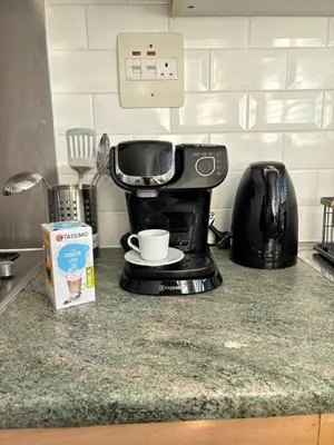 a coffee maker sitting on top of a kitchen counter at Cosy one bed Flat in Stevenage in Stevenage