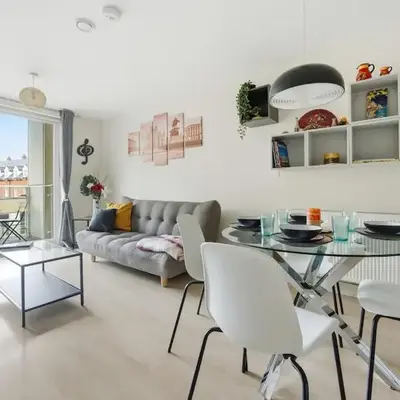 Steps from Train Station - Modern 2-Bedroom with Balcony & Cambridge Amenities