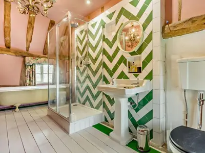 a bathroom with a sink and a shower at 4 Bed in Eye- oc-34389 in Thornham Magna
