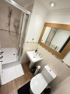 a bathroom with a toilet and a sink and a shower at Oak House No15 Scotland Road 5BR Parking in Chesterton