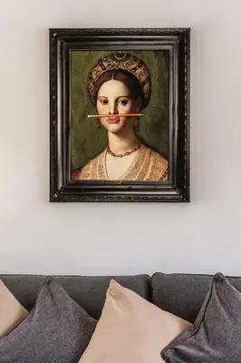 a painting of a woman with a toothbrush in her mouth at Blackshore House in Wenhaston
