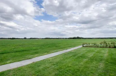 a walkway in a field with a green field at 2 Bed in Newton oc-ffba in Newton