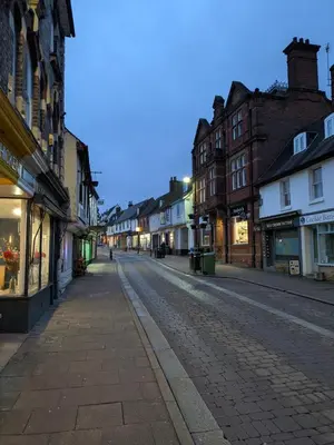 an empty street in a town with buildings at La Casa Bianca in Bury Saint Edmunds