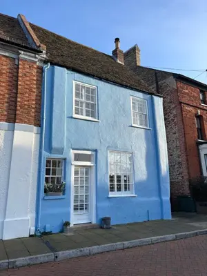 a blue and white house on a street at 7 The Quay in St Ives