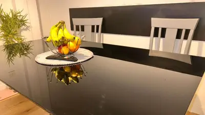 a bowl of bananas sitting on top of a table at Cozy Guest Room in Basildon with Shared Facilities in Basildon