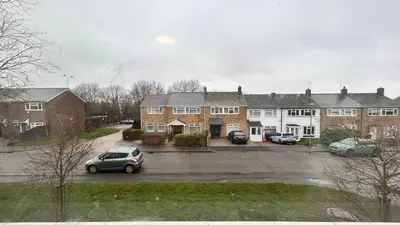 a house with a car parked in a parking lot at Charming Essex Guest Room Comfort, Convenience, and Countryside Charm in Basildon