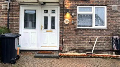 a brick house with a white door and windows at Serene Guest Room Retreat in Basildon with Private Entrance in Basildon