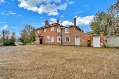 an old brick house with a large yard at Finest Retreats - Clavering Hall in Saffron Walden