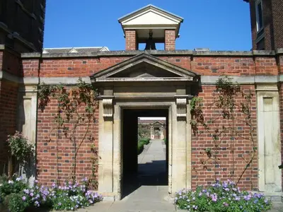 an entrance to a brick building with a doorway at St Catharine's College, Cambridge in Cambridge