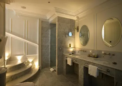 a bathroom with a sink and a shower and a tub at GreyFriars in Colchester