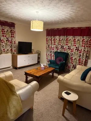 a living room with a couch and a coffee table at The Wright 1 bedroom place to stay large drive in East Harling